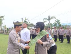 Kapolres Pelalawan Pimpin Launching Penggunaan Tanjak dan Selempang Personil Polres Pelalawan